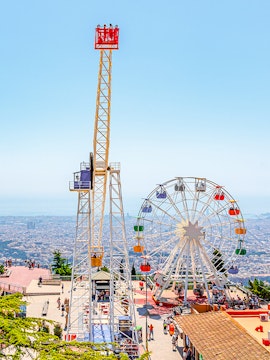 Tibidabo amusement park rides overlooking Barcelona, Spain.