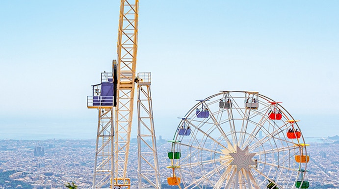 Tibidabo amusement park rides overlooking Barcelona, Spain.
