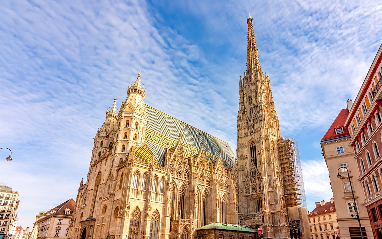 St. Stephen's Cathedral in Vienna with its colorful tiled roof and Gothic architecture.