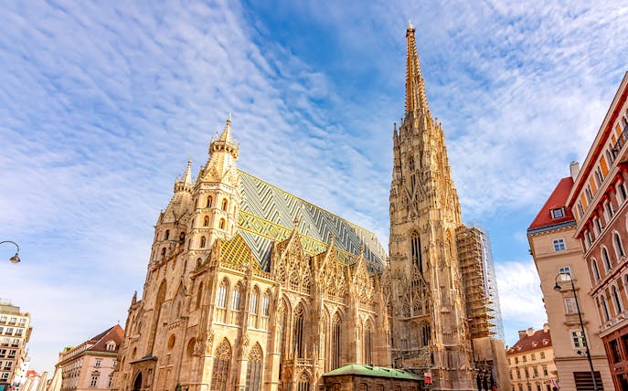 St. Stephen's Cathedral in Vienna with its colorful tiled roof and Gothic architecture.