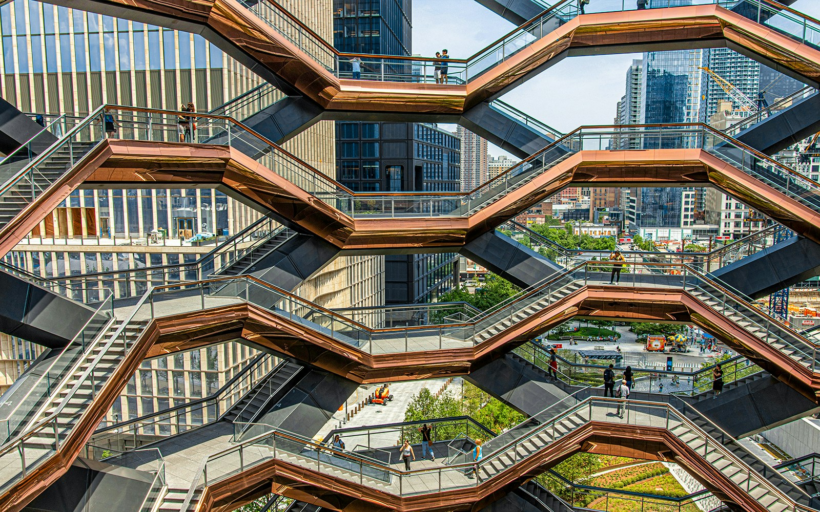 Vessel structure in New York's Hudson Yards with surrounding cityscape.