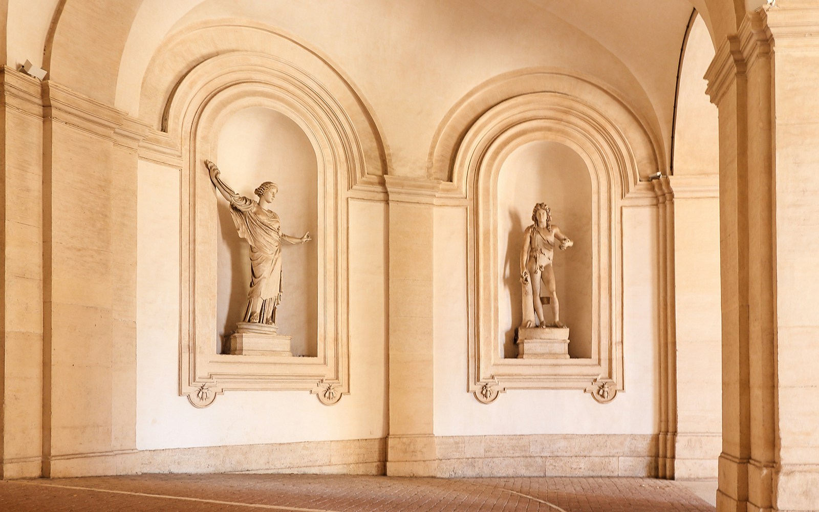 Palazzo Barberini portico with classical statues in Rome, Italy.
