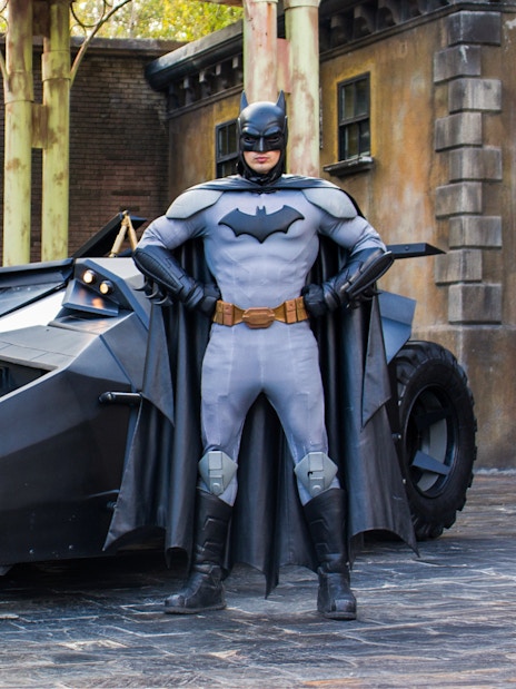 Batman standing with Batmobile at Parque Warner, Madrid.