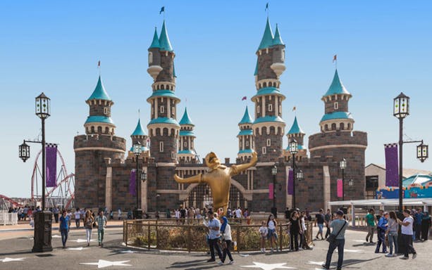 Vialand Theme Park entrance with castle towers and visitors, Istanbul.
