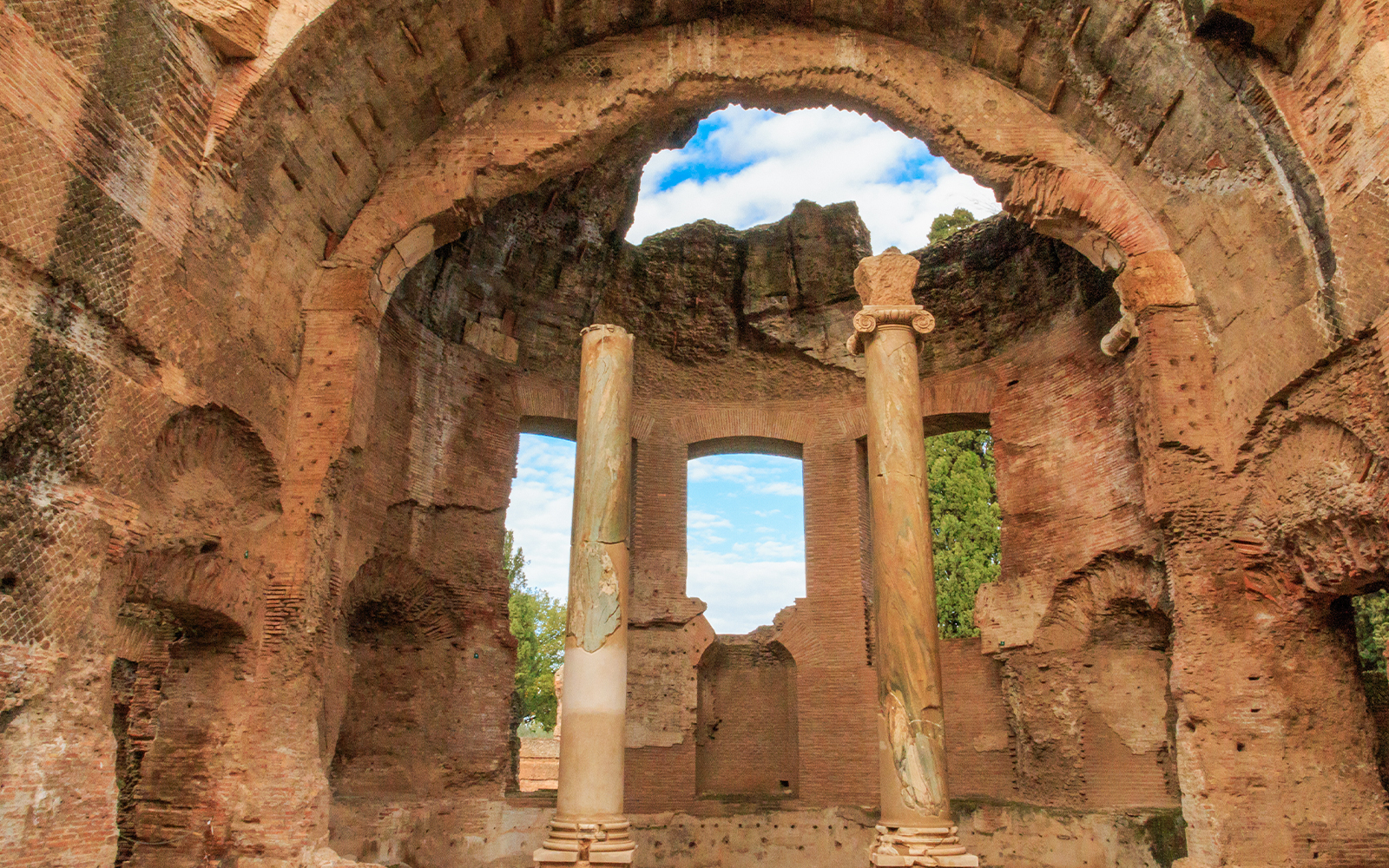 Ancient ruins with columns at Hadrian's Villa in Tivoli, Italy.