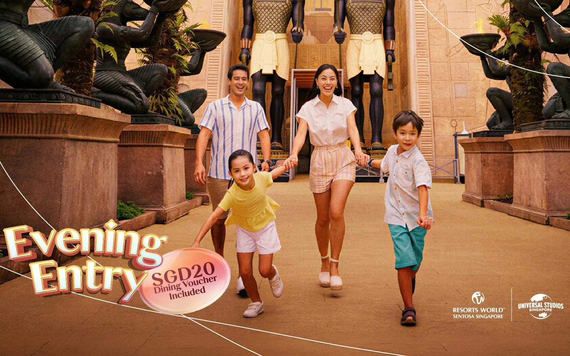 Family walking through Ancient Egypt zone at Universal Studios Singapore.