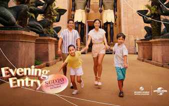 Family walking through Ancient Egypt zone at Universal Studios Singapore.