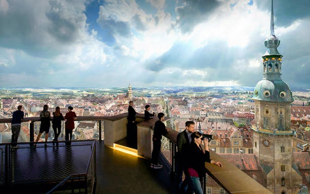Visitors observing Dresden cityscape from Panometer viewing platform.