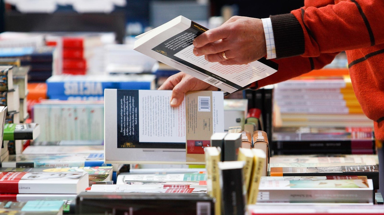 Visitors browsing through a well-stocked bookshop