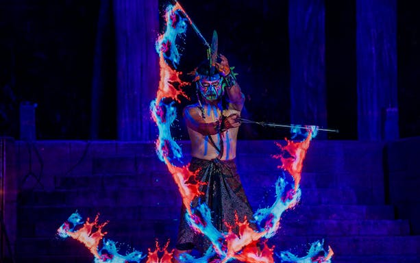 Performer with glowing fire effects at Sunway Lost World Hot Springs Night Park.