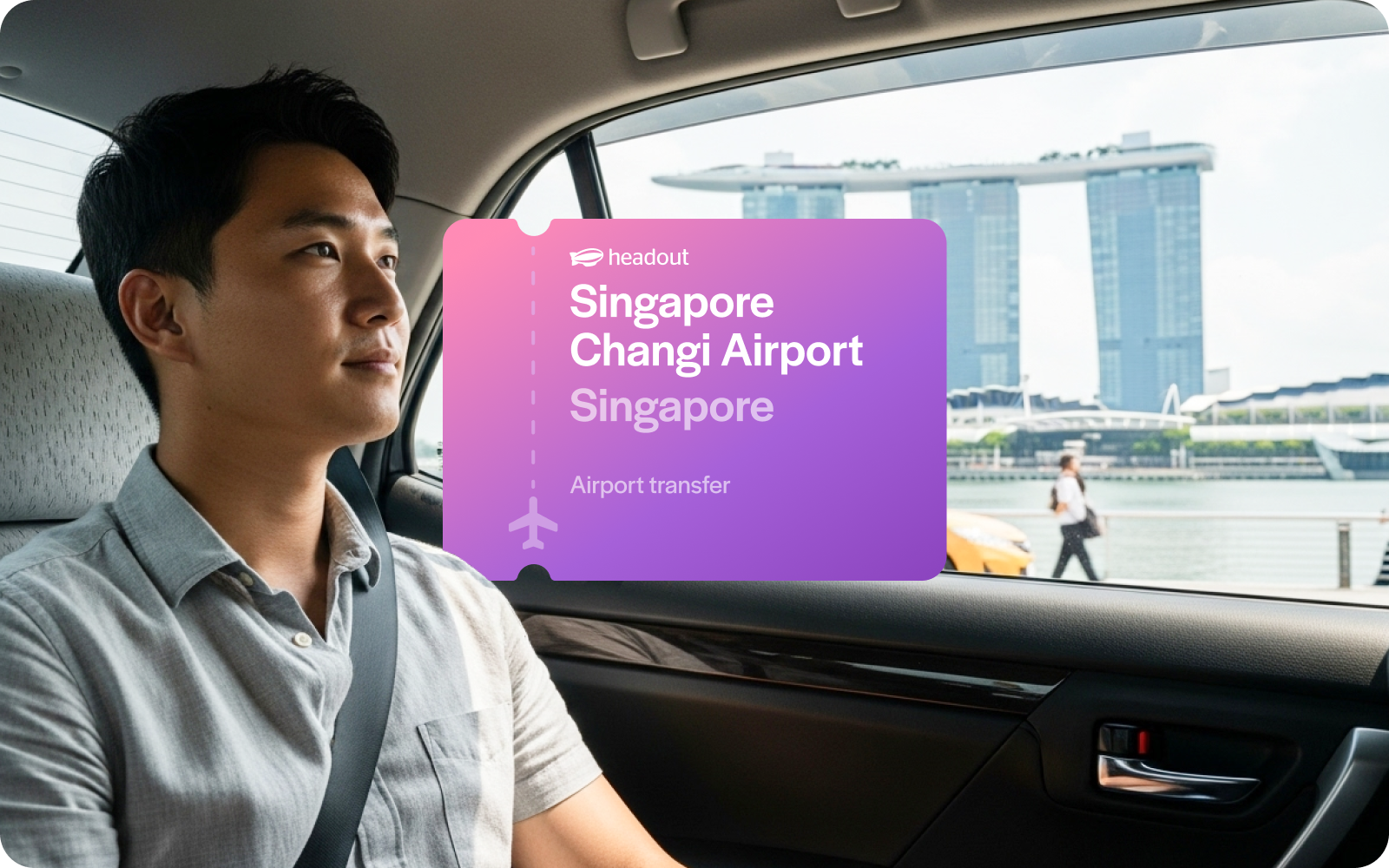 Private car transfer with view of Marina Bay Sands, Singapore.