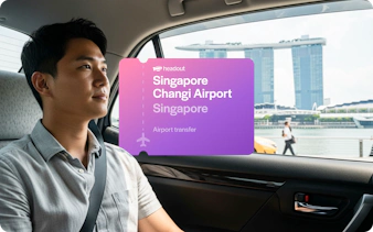 Private car transfer with view of Marina Bay Sands, Singapore.