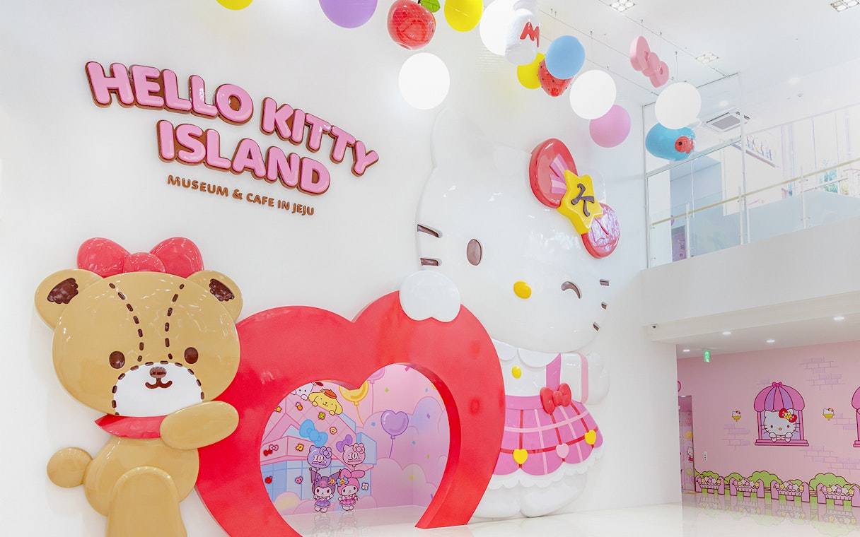 Hello Kitty Island interior with large Hello Kitty and bear figures in Jeju.