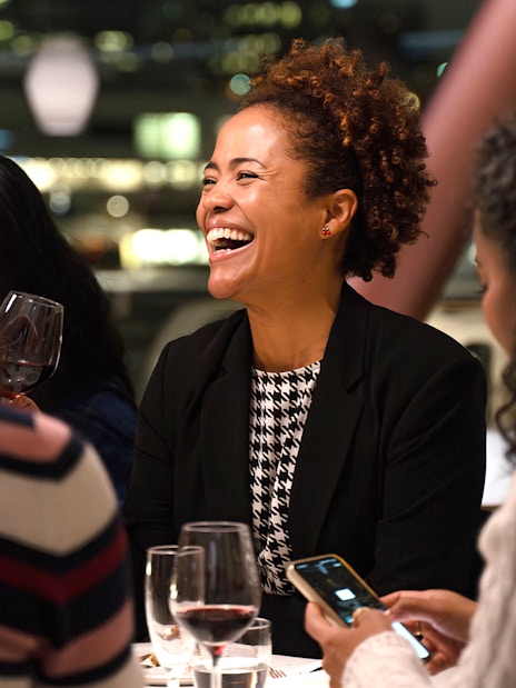 Guests enjoying a meal on an Oslo dinner cruise.