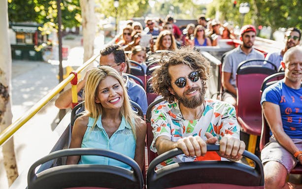 Visitors enjoying a ride on the Seattle Hop-On Hop-Off Bus.