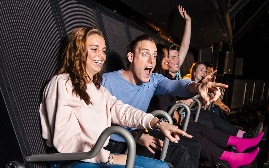 Tourists enjoying 5D ride at This Is Holland in Amsterdam.