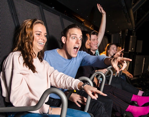 Tourists enjoying 5D ride at This Is Holland in Amsterdam.