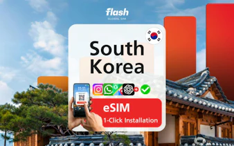 South Korea eSIM installation with smartphone in Seoul, traditional architecture in background.