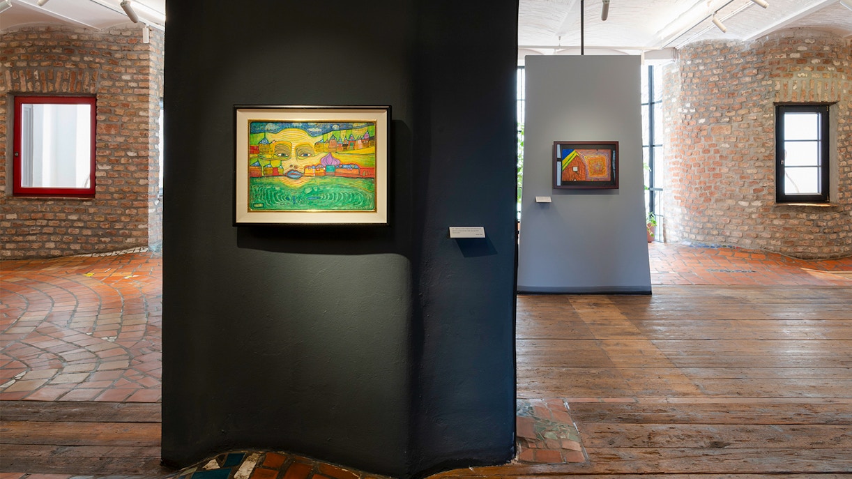 KUNST HAUS WIEN Hundertwasser Museum exhibit showcasing vibrant, colorful architecture and unique design elements.