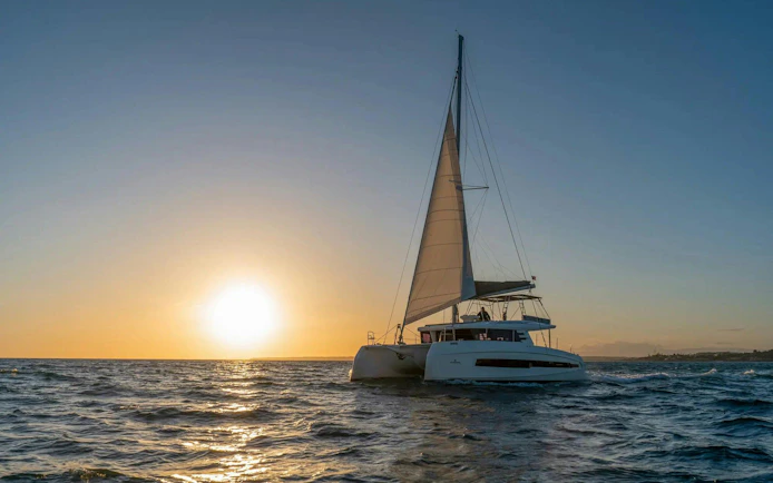 Catamaran sailing at sunset on Algarve tour from Vilamoura.