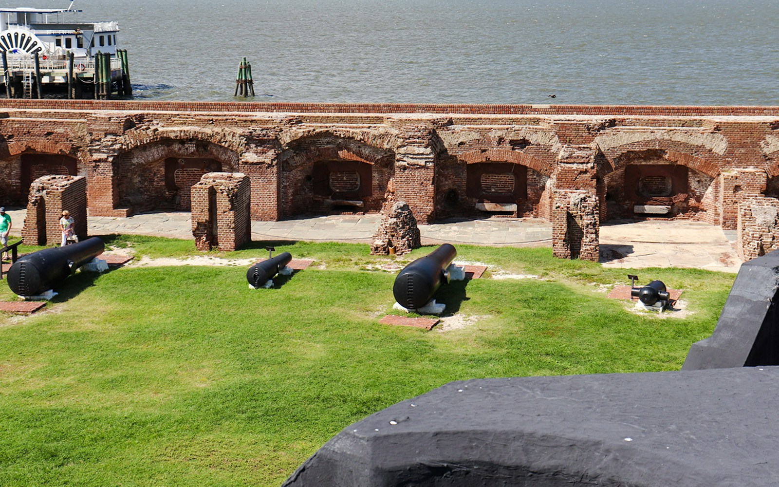 Cannons and brick fortifications at Fort Sumter National Monument, Charleston Harbor.