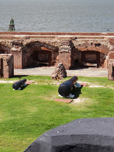 Cannons and brick fortifications at Fort Sumter National Monument, Charleston Harbor.