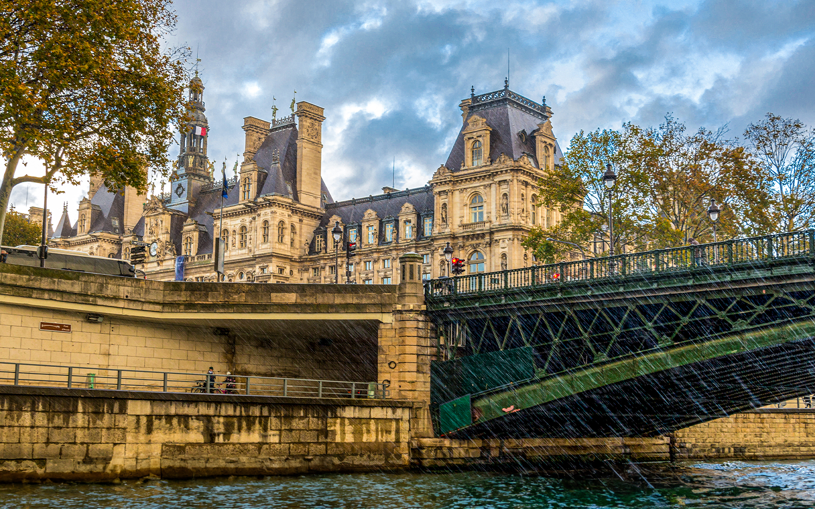 view of hotel de vill on river cruise in paris
