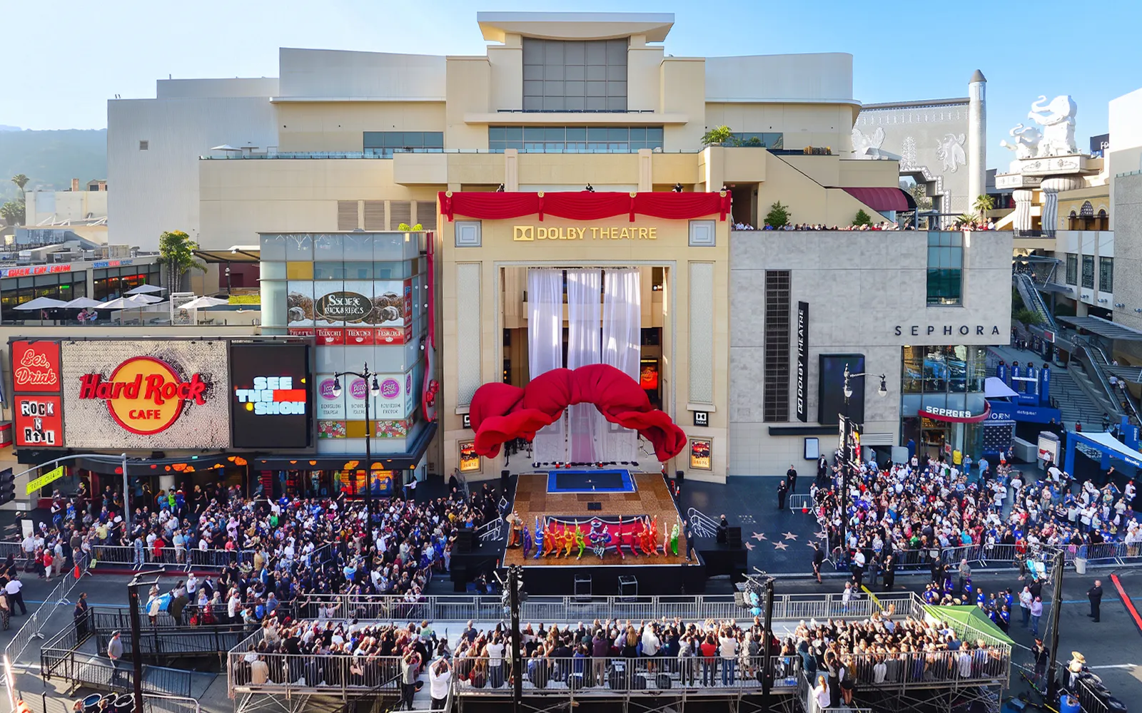 Dolby Theatre exterior facade with crowd and stage in Hollywood, Los Angeles.