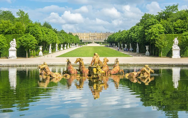 Fountain of Apollo in the gardens of the Palace of Versailles, France.