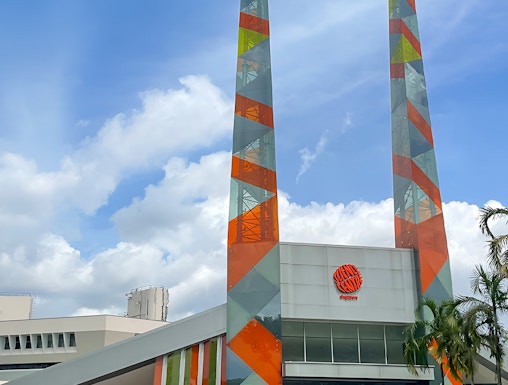 Science Centre Singapore entrance with colorful geometric towers.