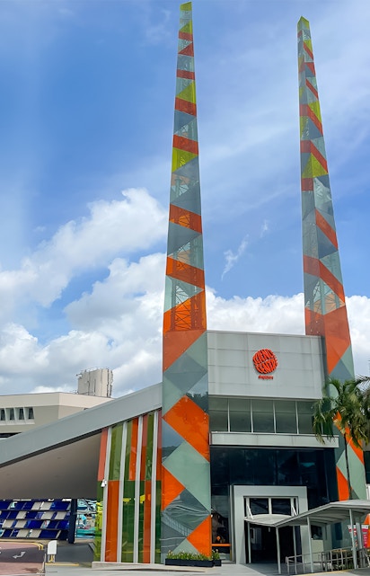 Science Centre Singapore entrance with colorful geometric towers.