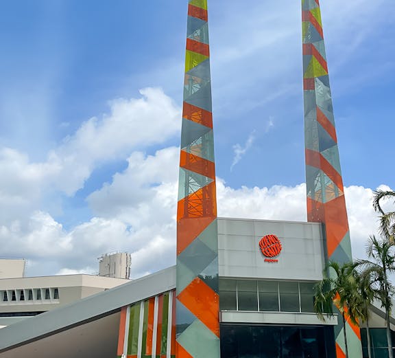 Science Centre Singapore entrance with colorful geometric towers.