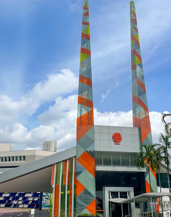 Science Centre Singapore entrance with colorful geometric towers.