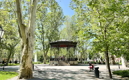 Gazebo in Zagreb park surrounded by trees, part of small group guided tour.