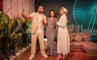 Balqees Fathi wax figure with visitors at Madame Tussauds Dubai, near Dubai Eye.