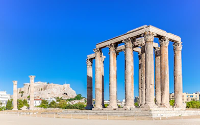 Temple of Olympian Zeus with Acropolis Hill in the background, Athens.