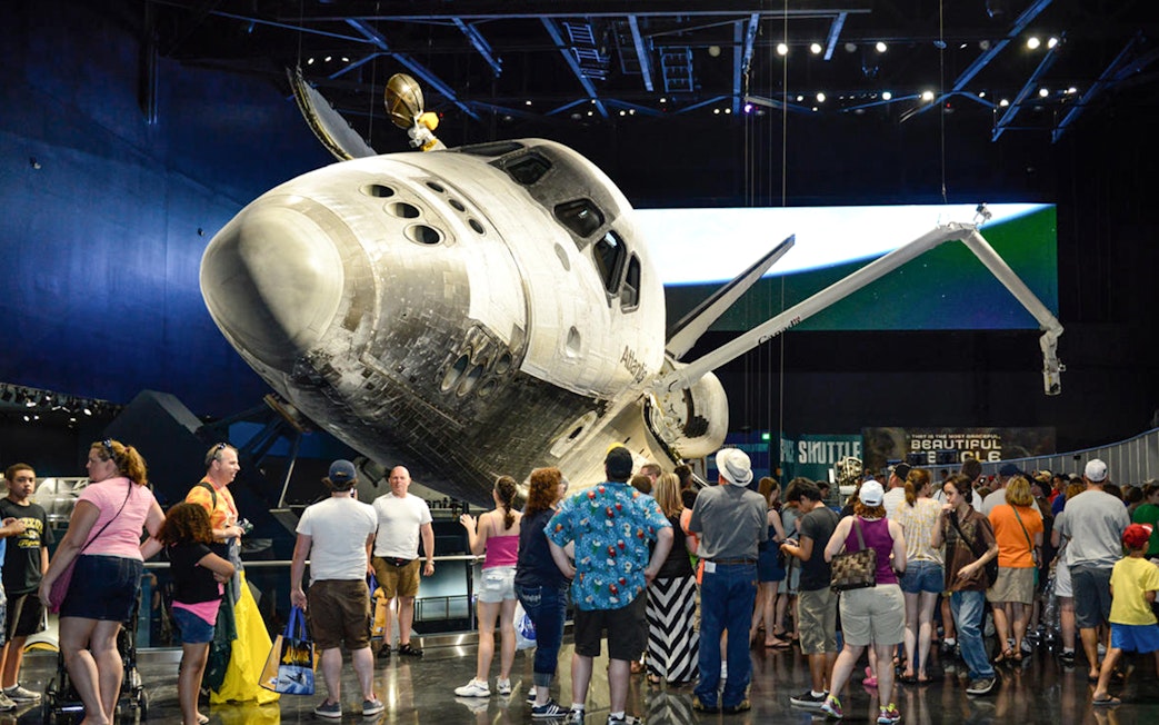 Visitors viewing Space Shuttle Atlantis at Kennedy Space Center.