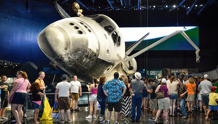 Visitors viewing Space Shuttle Atlantis at Kennedy Space Center.
