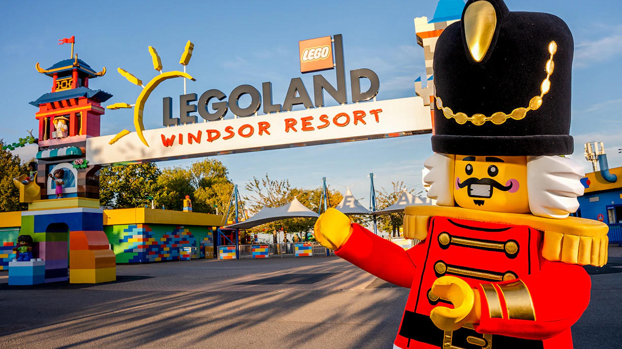 Legoland Windsor entrance with colorful Lego structures and a toy soldier figure.