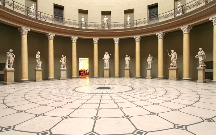 Interior of Altes Museum with classical statues and columns, Berlin.