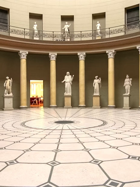 Interior of Altes Museum with classical statues and columns, Berlin.