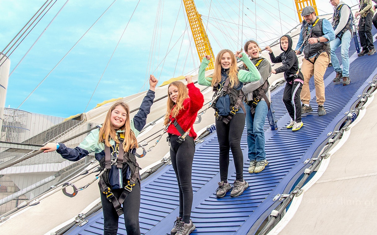 Group climbing the O2 Arena roof in London, part of the Combo: The FRIENDS™ Experience + Up At The O2 tour.