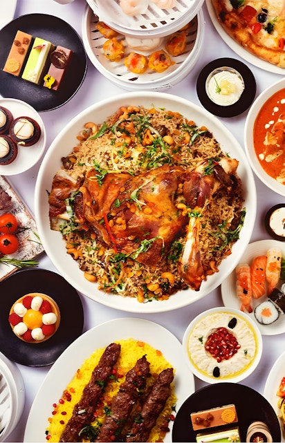 Variety of international dishes at Kaleidoscope Atlantis Dubai buffet.