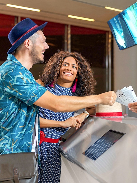 Visitors receiving tickets for Burj Khalifa's SKY level observation deck in Dubai.
