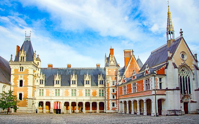 Royal Blois Castle exterior with Gothic and Renaissance architecture, France.