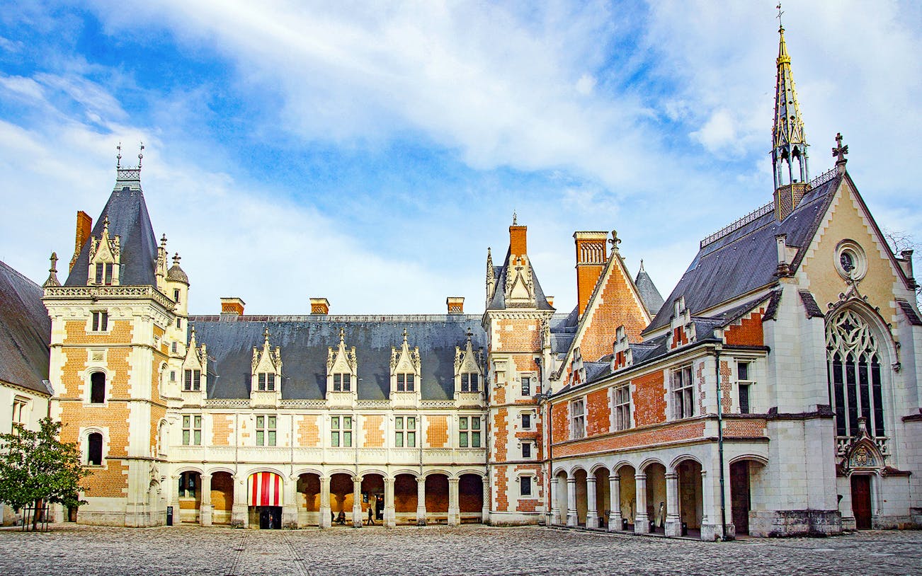 Royal Blois Castle exterior with Gothic and Renaissance architecture, France.