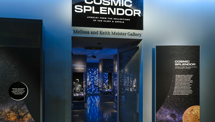 Cosmic Splendor exhibit at American Museum of Natural History featuring vibrant galaxy and star formations.
