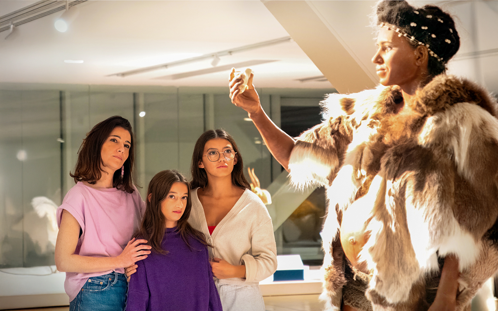 Visitors observing a prehistoric exhibit at Cosquer Cave, Marseille.