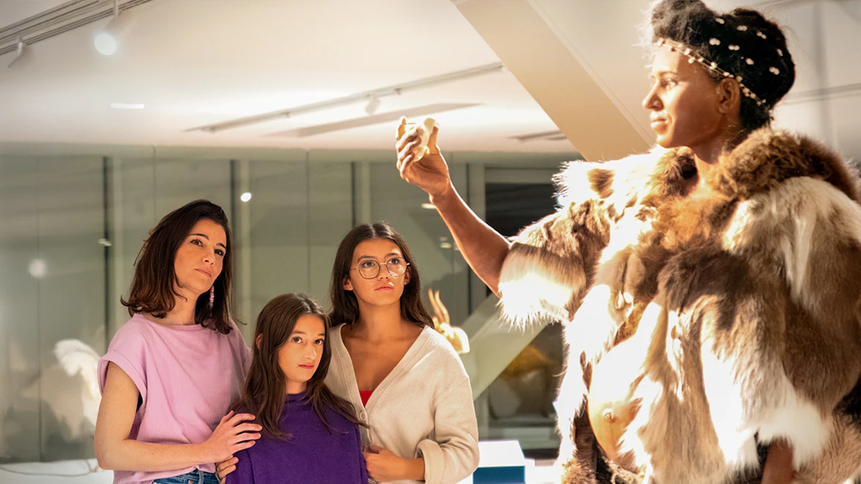 Visitors observing a prehistoric exhibit at Cosquer Cave, Marseille.
