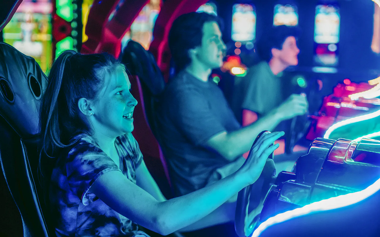People enjoying arcade games on Akihabara Retro Gaming & Anime Group Walking Tour.